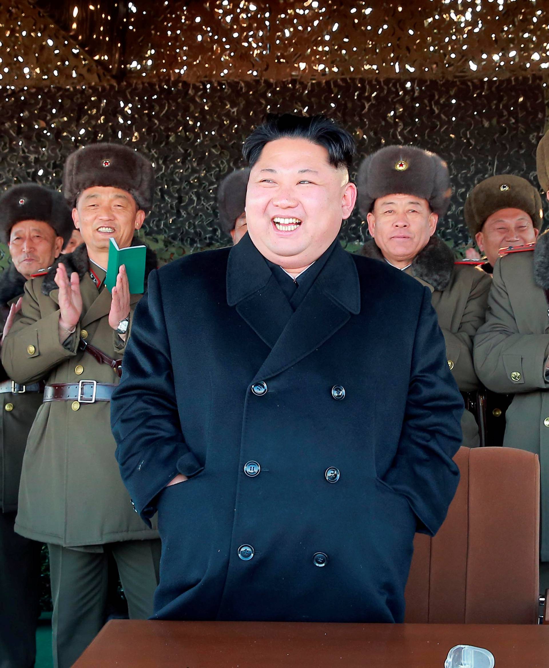 North Korean leader Kim Jong Un attends an intensive artillery drill of the KPA artillery units