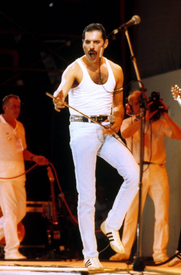 1985: File photo dated July 1985 of Freddie Mercury of Queen on stage during the Live Aid Concert at Wembley Stadium. Issue date: Thursday September 8, 2022.