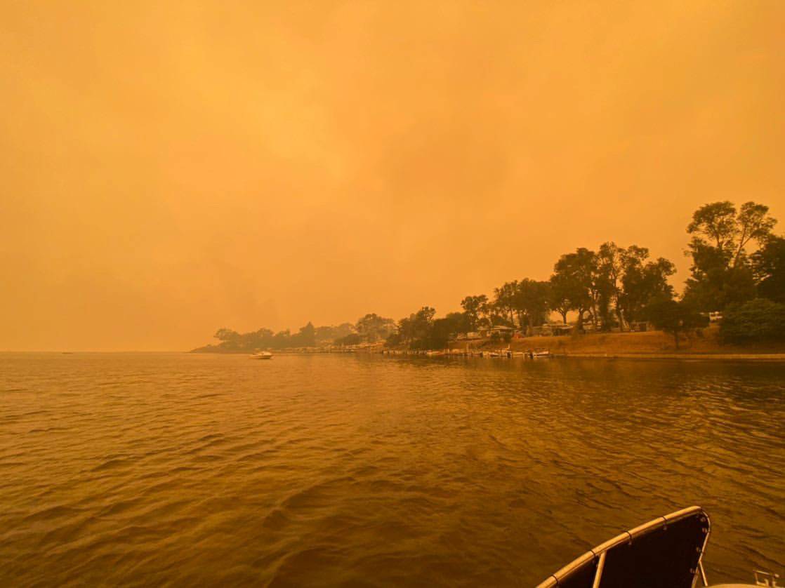 A view shows smoke from wild bushfires engulfing the sky in Mallacoota