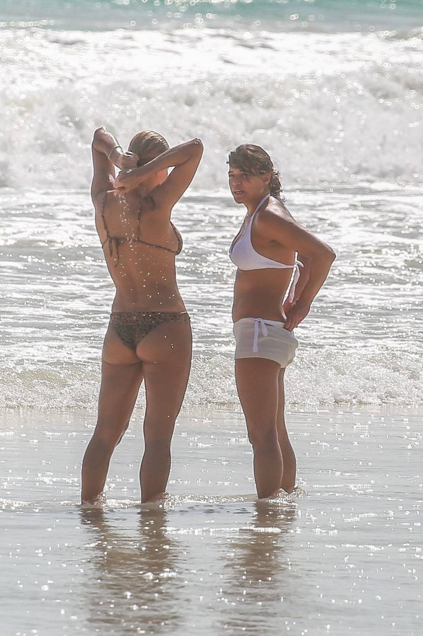 *EXCLUSIVE* Michelle Rodriguez shows a bit too much on white bikini while vacationing with a mystery blonde in Tulum