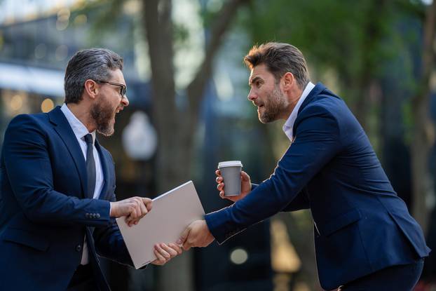 Businessmen,Fighting,Outdoor.,Business,Conflict,Between,Business,Men,In,Formal-wear