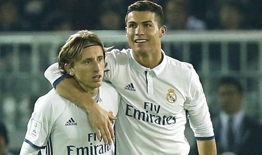 Real Madrid's Cristiano Ronaldo celebrates scoring their fourth goal with Luka Modric