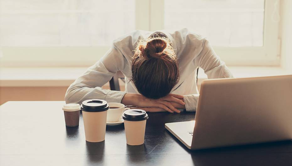 Tired woman in the office