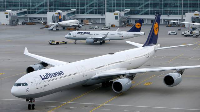 FILE PHOTO: Lufthansa planes arrive at the international airport in Munich