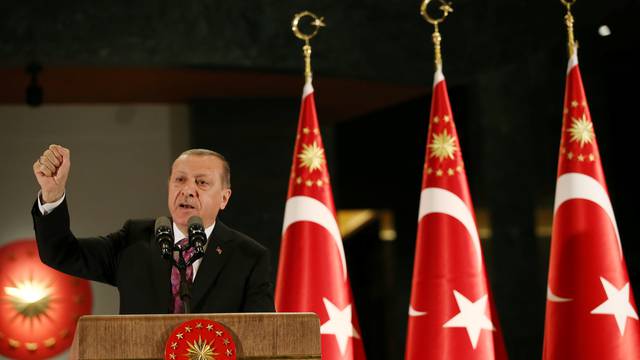 Turkish President Erdogan makes a speech during a fast-breaking iftar dinner at the Presidential Palace in Ankara