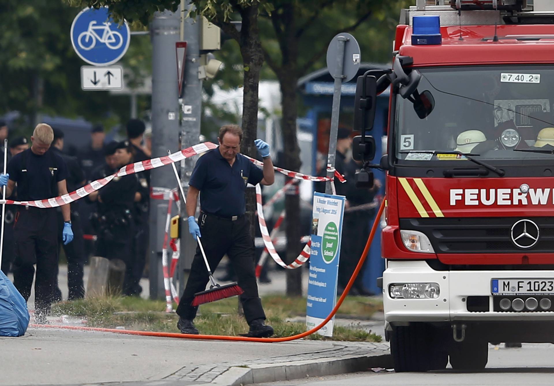 Members of the fire brigade attend scene near shooting rampage at Olympia shopping mall in Munich