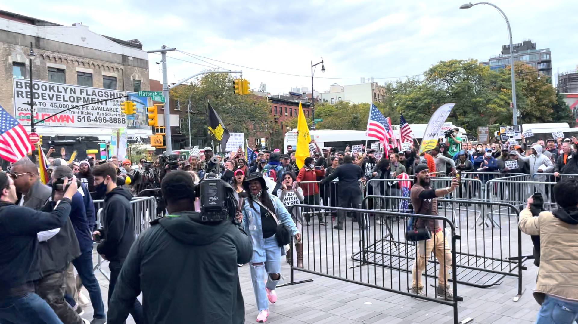 Demonstrators shout slogans outside the Barclays Center in New York