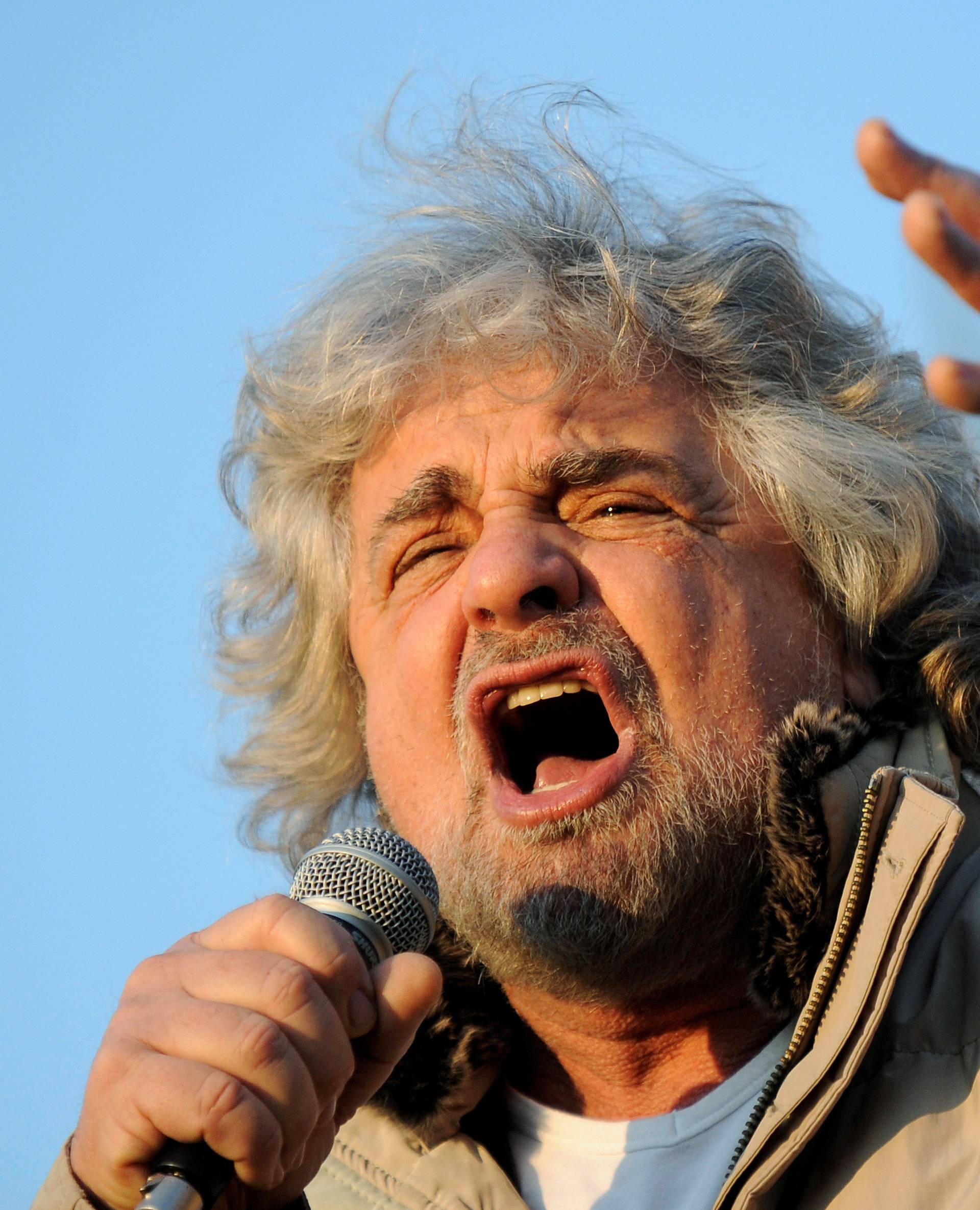 Five Star Movement leader and comedian Beppe Grillo gestures during a rally in Turin