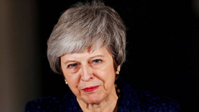 FILE PHOTO: Britain's Prime Minister Theresa May speaks outside 10 Downing Street after a confidence vote by Conservative Party members of parliament, in London