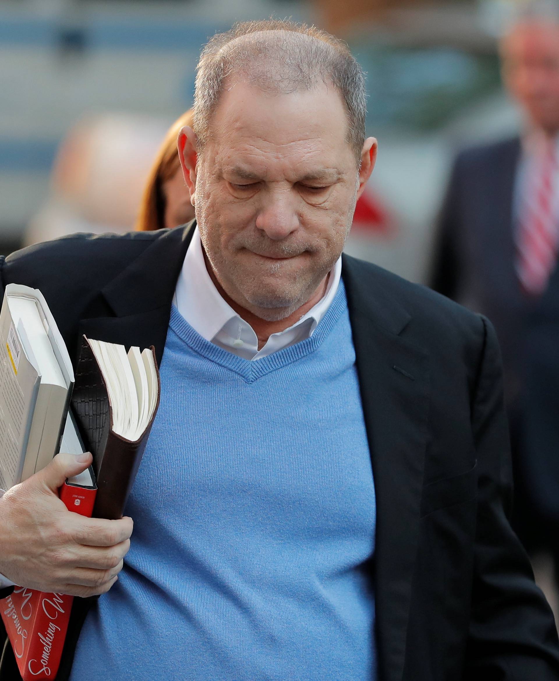 Film producer Harvey Weinstein arrives at the 1st Precinct in Manhattan in New York