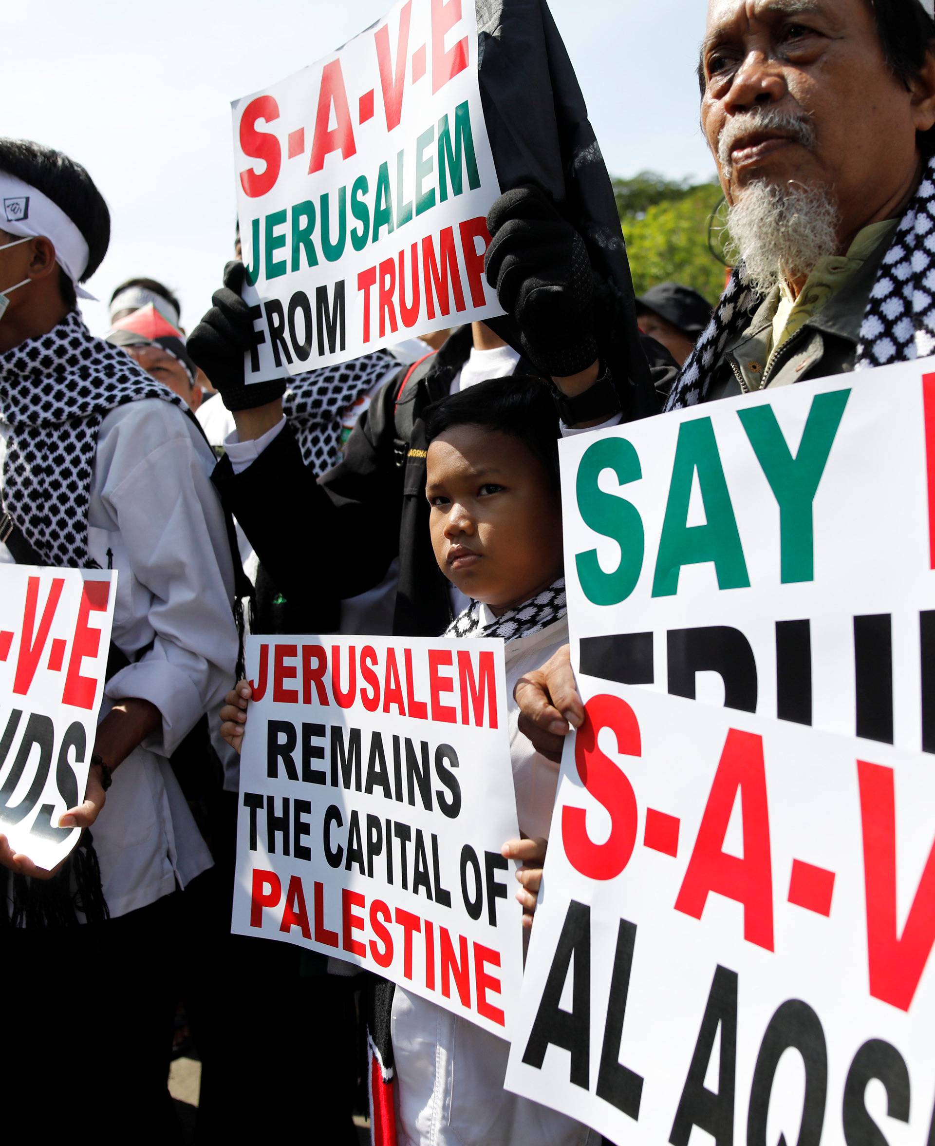 Muslim groups protest to condemn Washington's decision to recognize Jerusalem as Israel's capital outside the U.S. embassy in Jakarta