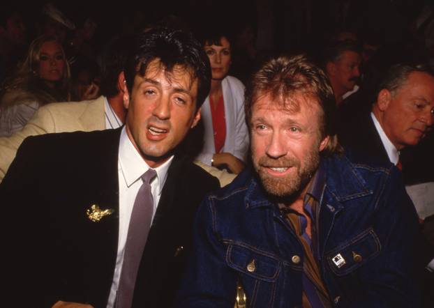 **FILE PHOTO** Chuck Norris Has Passed Away. Sylvester Stallone and Chuck Norris Circa 1980's Credit: Ralph Dominguez/MediaPunch