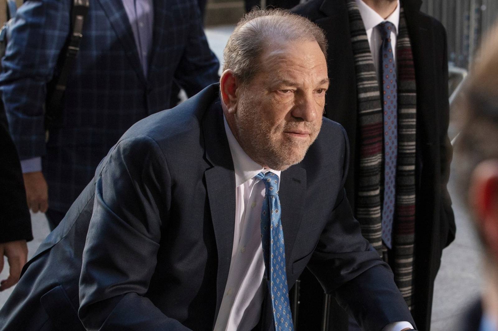 FILE PHOTO: Harvey Weinstein arrives at New York Criminal Court for another day of jury deliberations in his sexual assault trial in the Manhattan borough of New York City