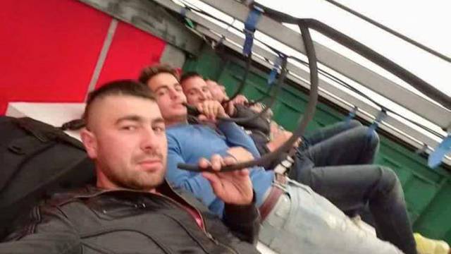 Brazen images show Albanians hiding in lorries and posing for 's