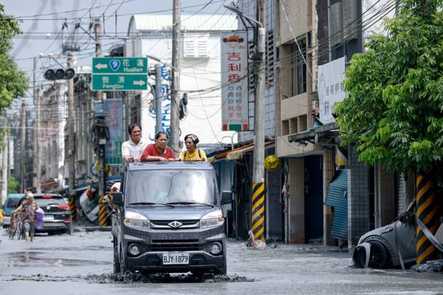 People evacuate, amid flooding due to Super Typhoon Ragasa in Hualien
