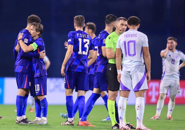 Slavlje hrvatskih igrača nakon pobjede u suretu sa Škotskom