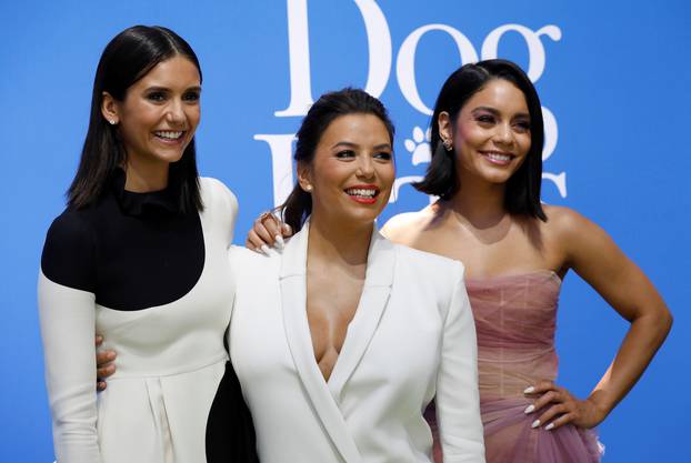 Cast member Dobrev, Longoria and Hudgens pose at the premiere for the movie "Dog Days" in Los Angeles