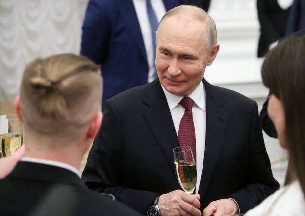 Russian President Vladimir Putin presents awards to young scientists in Moscow