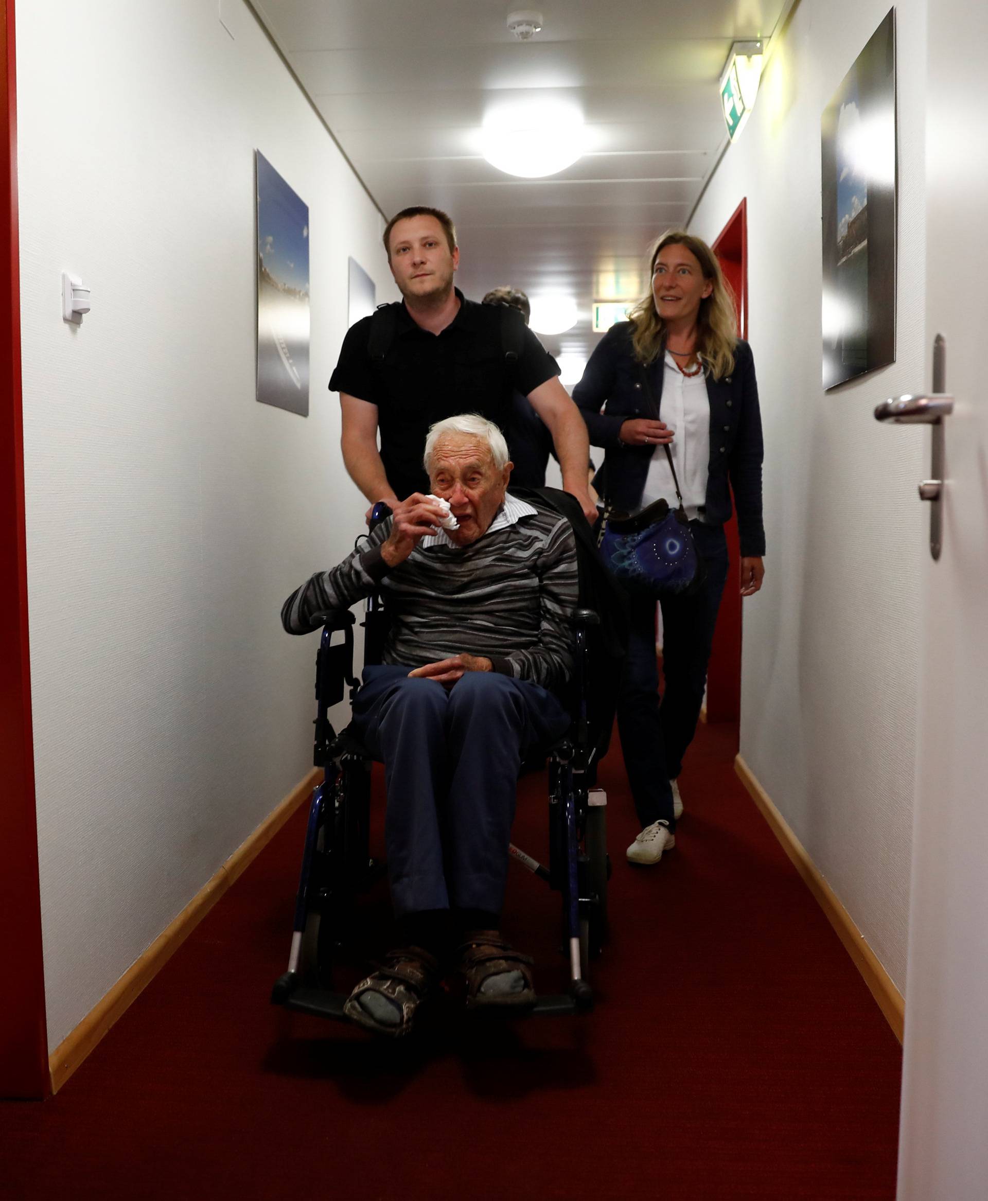 David Goodall, 104, arrives to hold a news conference a day before he intends to take his own life in assisted suicide, in Basel