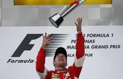 Vettel u Maleziji izborio sebi i Ferrariju dugo željenu pobjedu