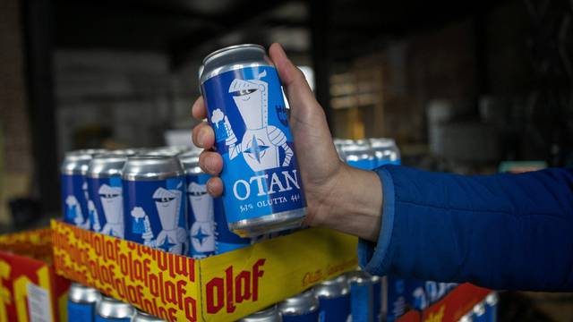 Nato-branded OTAN beer cans by Olaf Brewing Company are pictured in Savonlinna