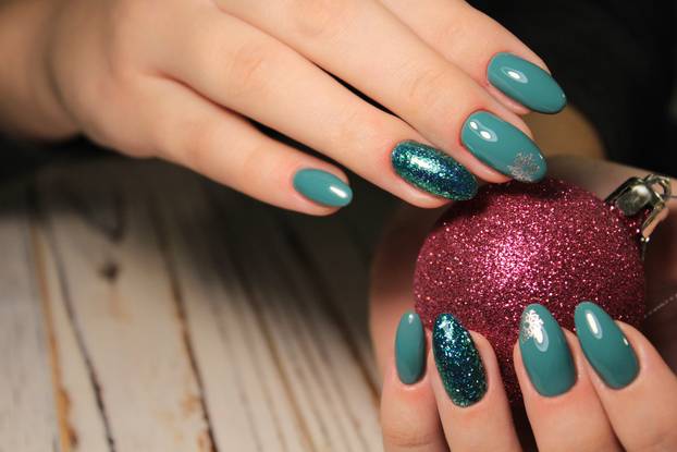 Christmas Nail art manicure. Winter Holiday style bright Manicure