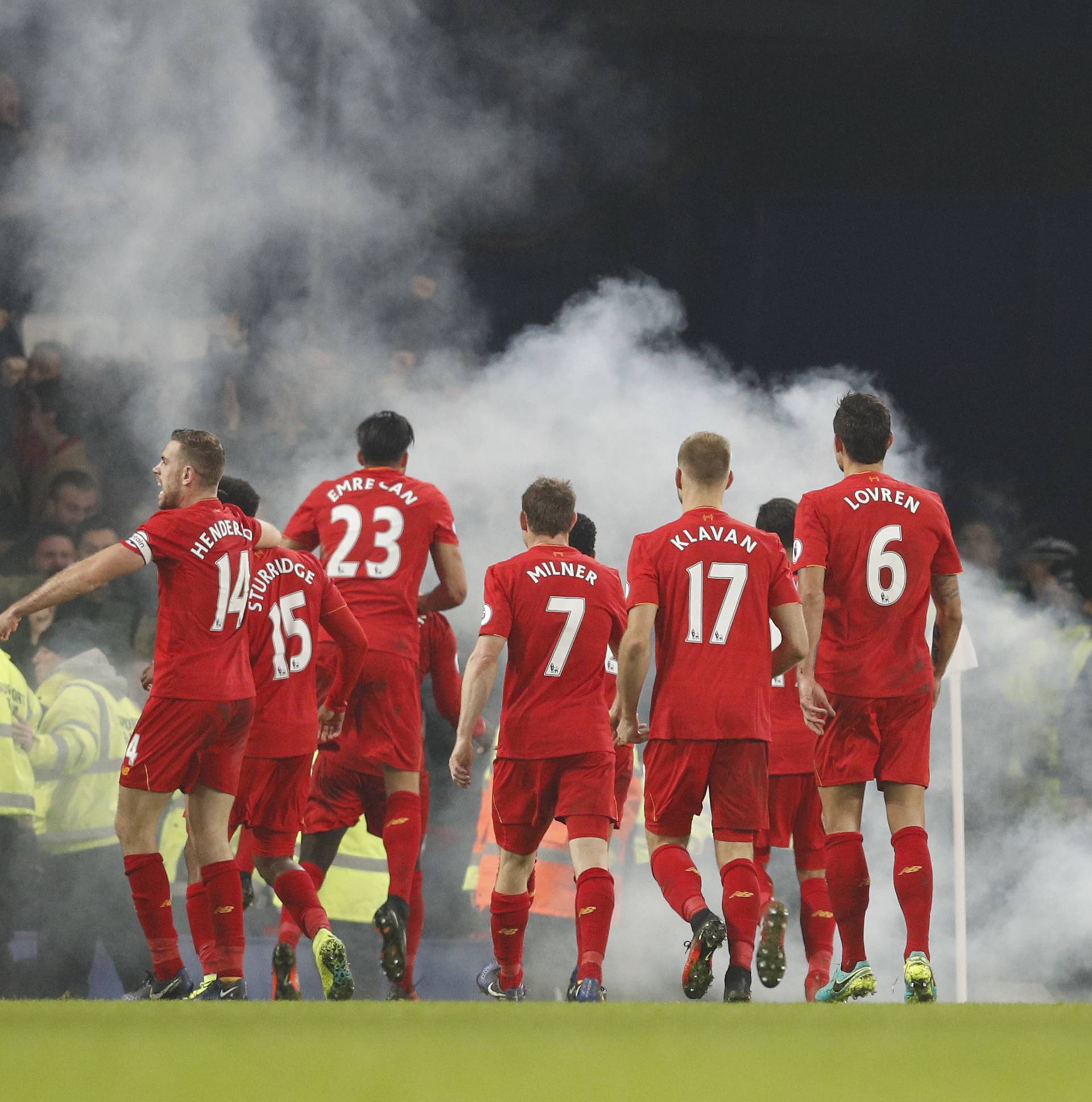 Liverpool's Sadio Mane celebrates scoring their first goal with teammates