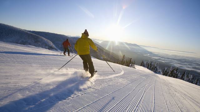 USA, Montana, Whitefish, Two man on ski slope