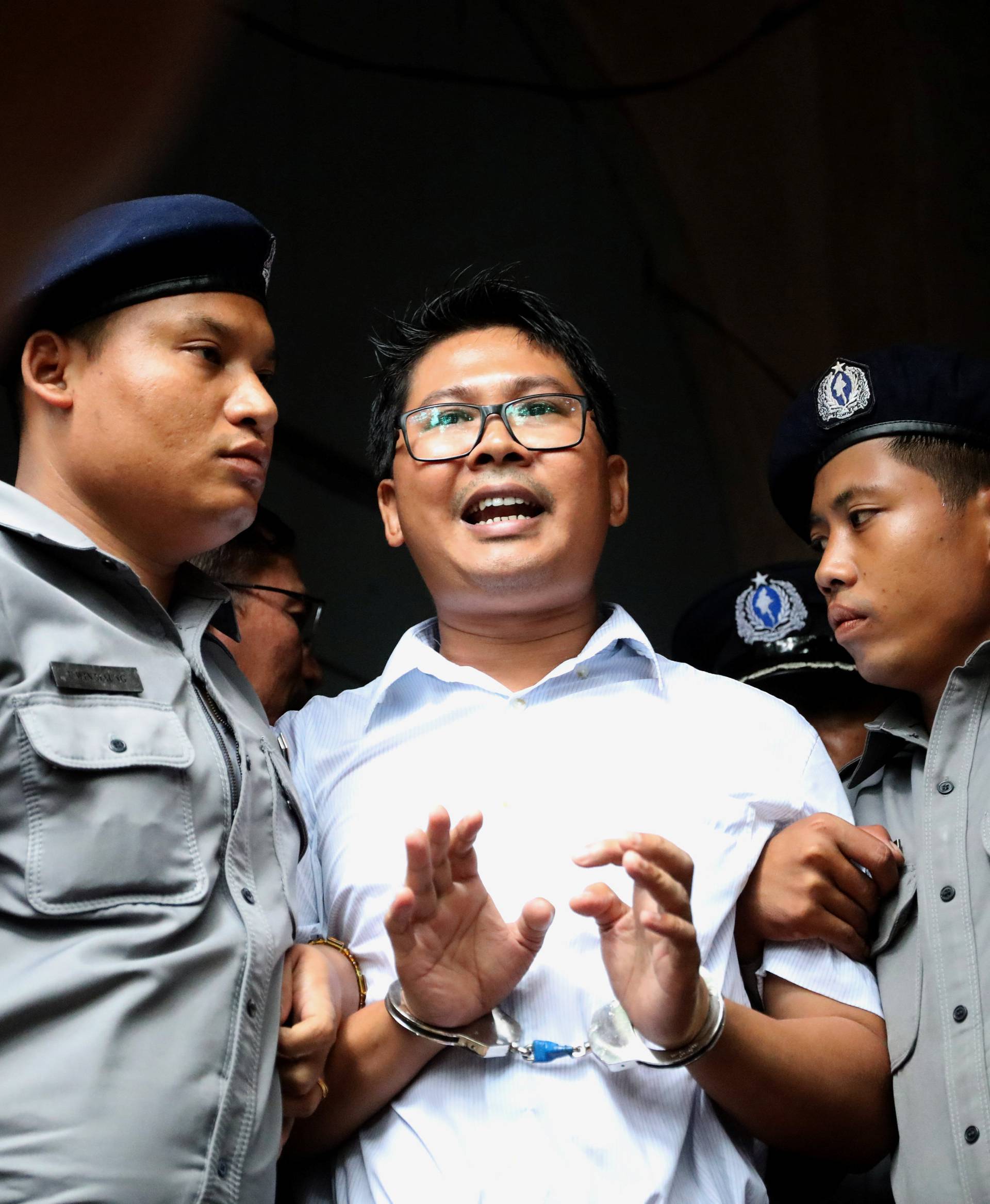 Reuters journalist Wa Lone departs Insein court after his verdict announcement in Yangon