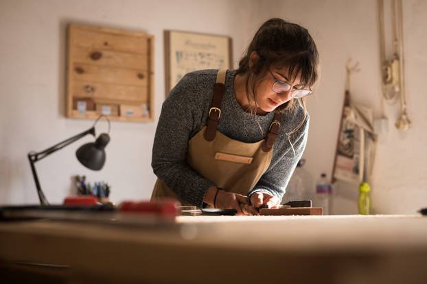 A,Young,Female,Carpenter,Working,As,Wood,Designer,In,A