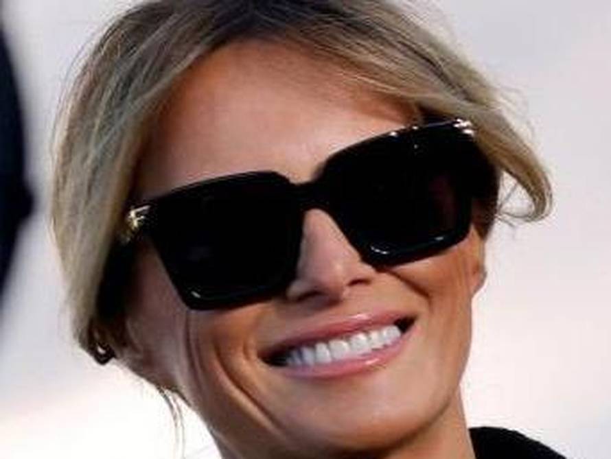 First lady Trump smiles at Joint Base Andrews, Maryland