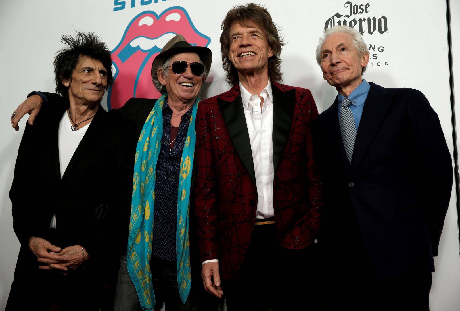 FILE PHOTO: The Rolling Stones pose as they arrive for the opening of the new exhibit "Exhibitionism: The Rolling Stones" in New York