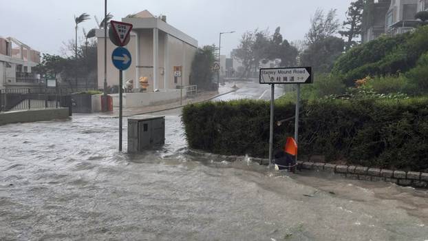 Floodwaters engulf Stanley Mound Road in the aftermath of Super Typhoon Ragasa in Hong Kong
