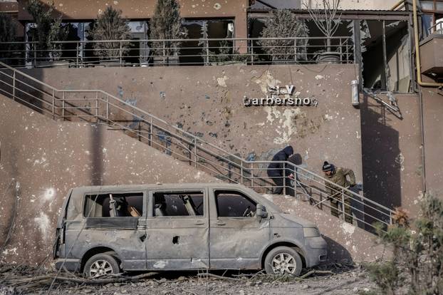 Aftermath of an overnight Russian drone and missile strike in Kyiv