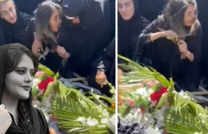 Potresna snimka iz Irana: Žena reže kosu na bratovom lijesu. Poginuo je na prosvjedu