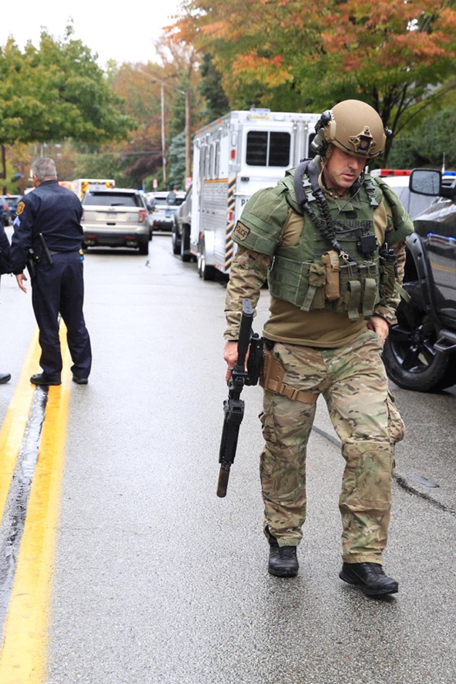 Police officers respond after a gunman opened fire at the Tree of Life synagogue in Pittsburgh Pennsylvania