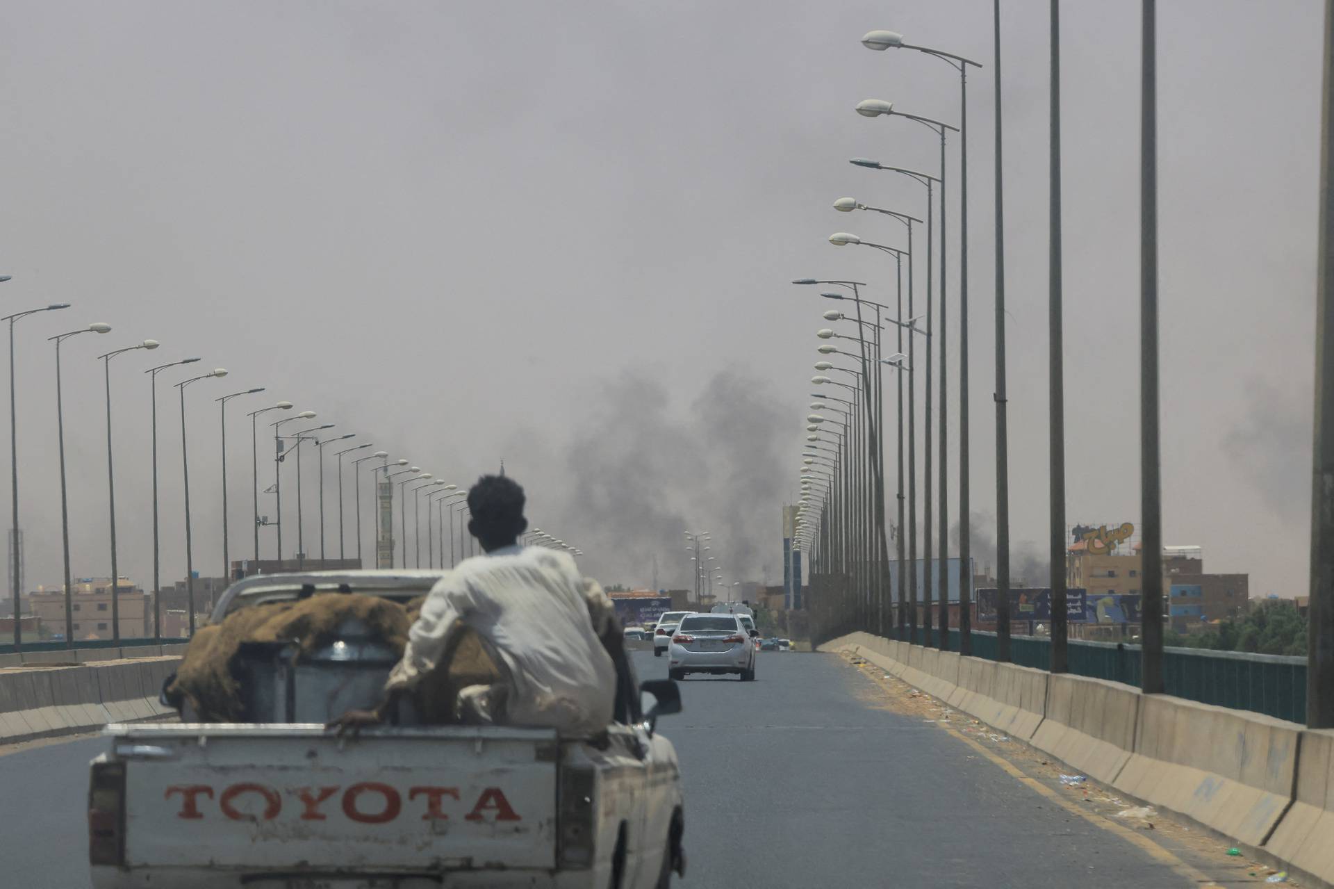 Smoke rises near Halfaya Bridge between Omdurman and Khartoum North