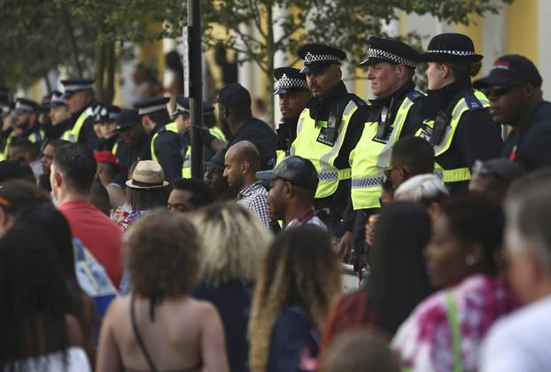 Police keep watch at the Notting Hill Carnival in London