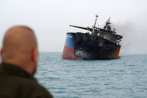 A foreign tanker carrying Iraqi fuel oil damaged after catching fire in Iraq's territorial waters, near Basra