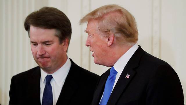 FILE PHOTO: President Trump appears with U.S. Supreme Court nominee Kavanaugh at his nomination announcement at the White House in Washington