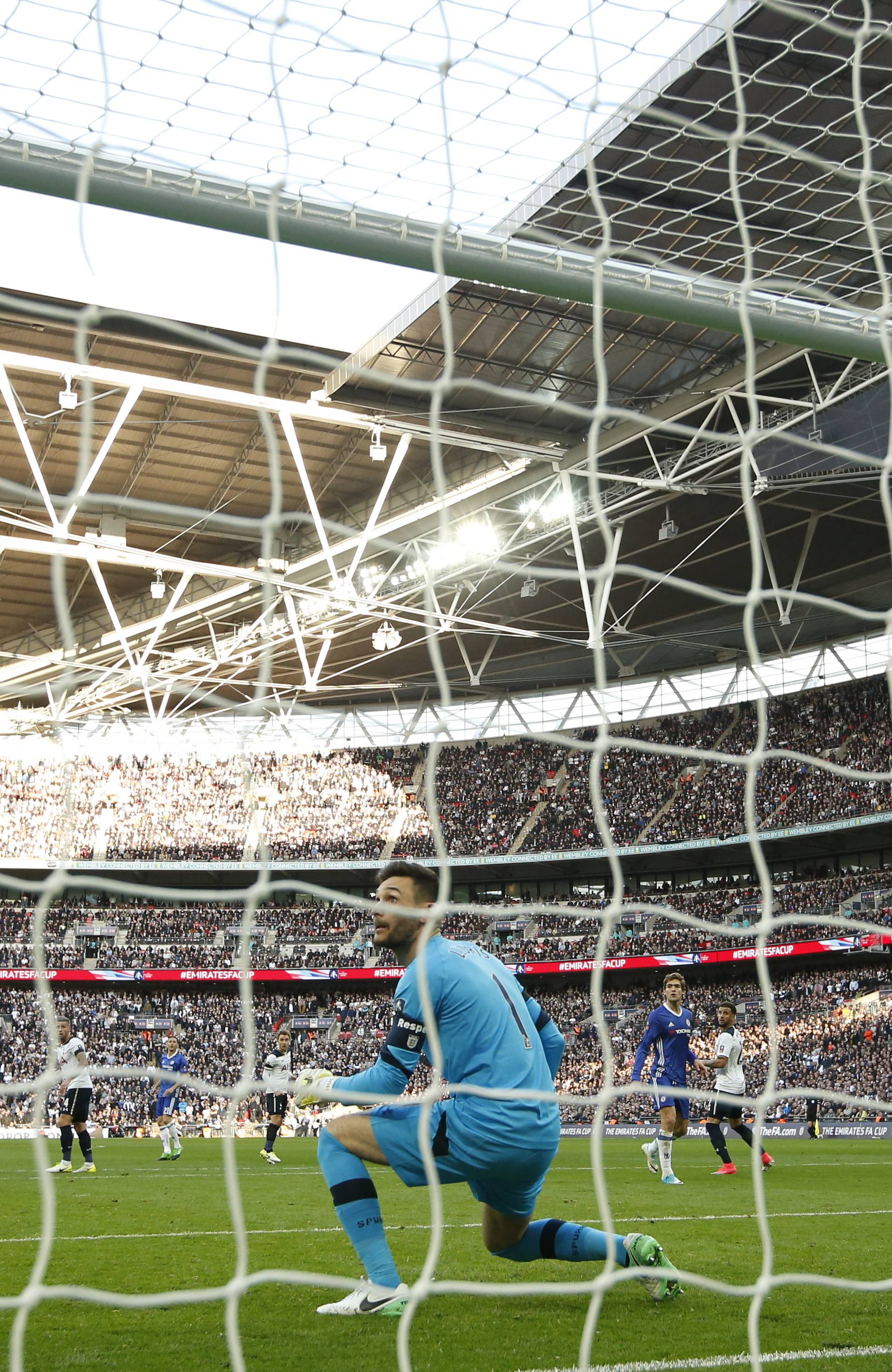 Chelsea's Nemanja Matic scores their fourth goal past Tottenham's Hugo Lloris