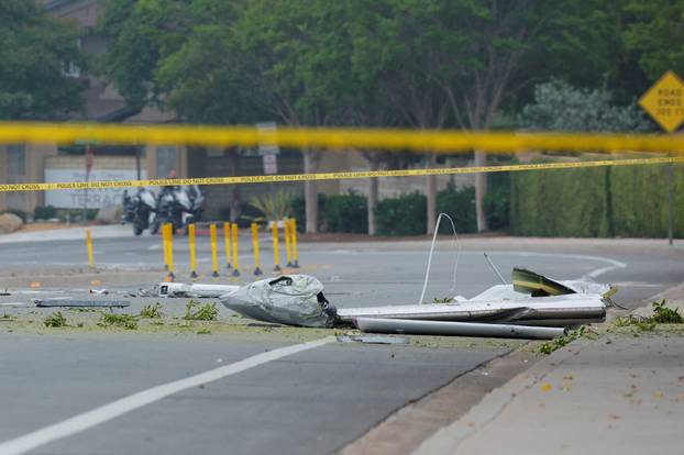 Crash scene after a civilian aircraft went down in a military neighborhood, in San Diego