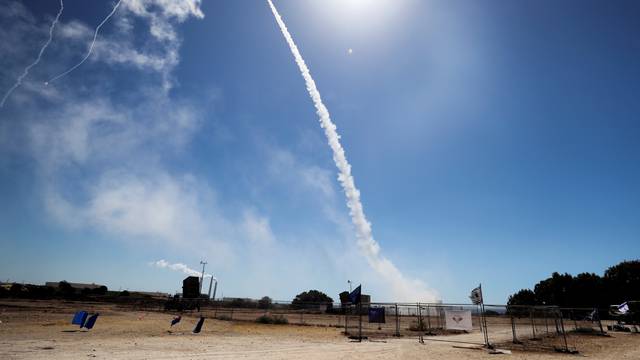 Israel's Iron Dome anti-missile system fires to intercept a rocket launched from the Gaza Strip towards Israel, as seen from Ashkelon