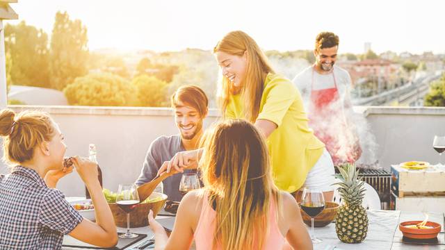 Happy,Friends,Doing,Barbecue,Dinner,In,Patio,Terrace,-,Young