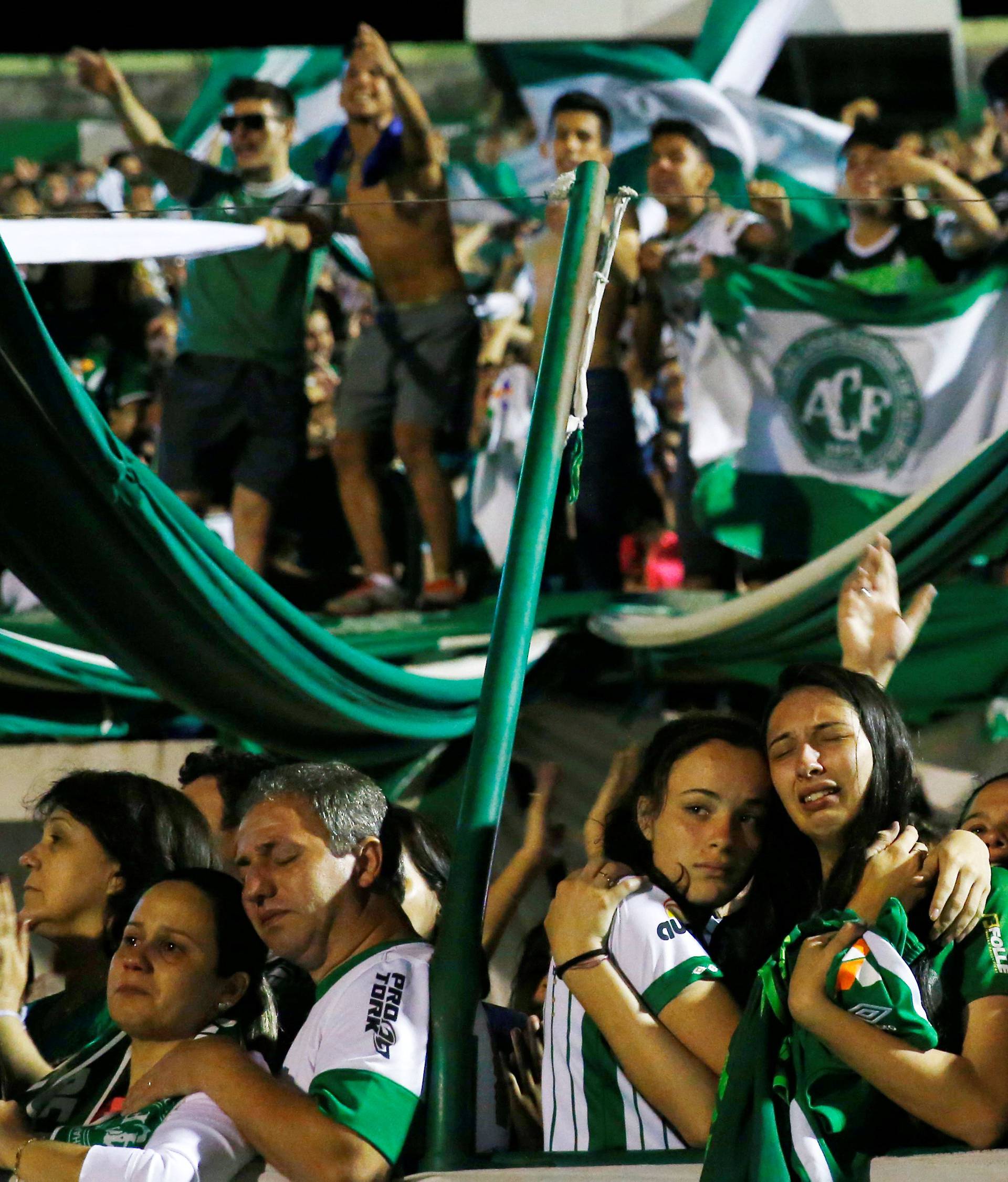 Fans of Chapecoense soccer team pay tribute to Chapecoense's players at the Arena Conda stadium in Chapeco