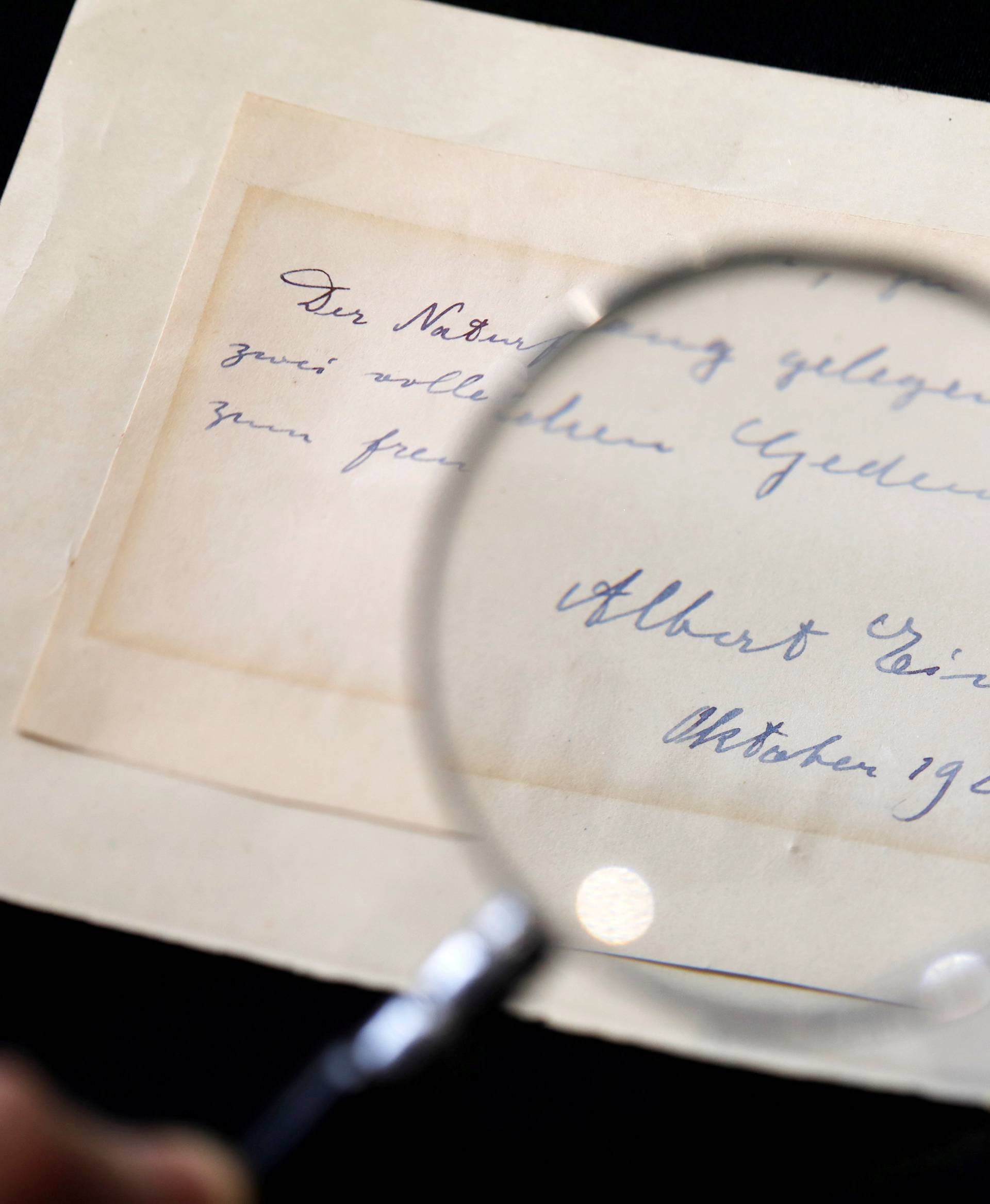 A note written by Albert Einstein to Italian chemistry student Elisabetta Piccini in Florence, Italy, in 1921 is seen before it is sold at an auction in Jerusalem