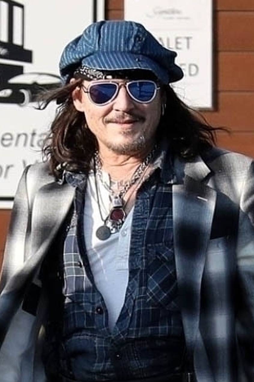 *EXCLUSIVE* Johnny Depp uses a cane while arriving in Boston for his Hollywood Vampires show after being forced to reschedule due to ankle fracture.