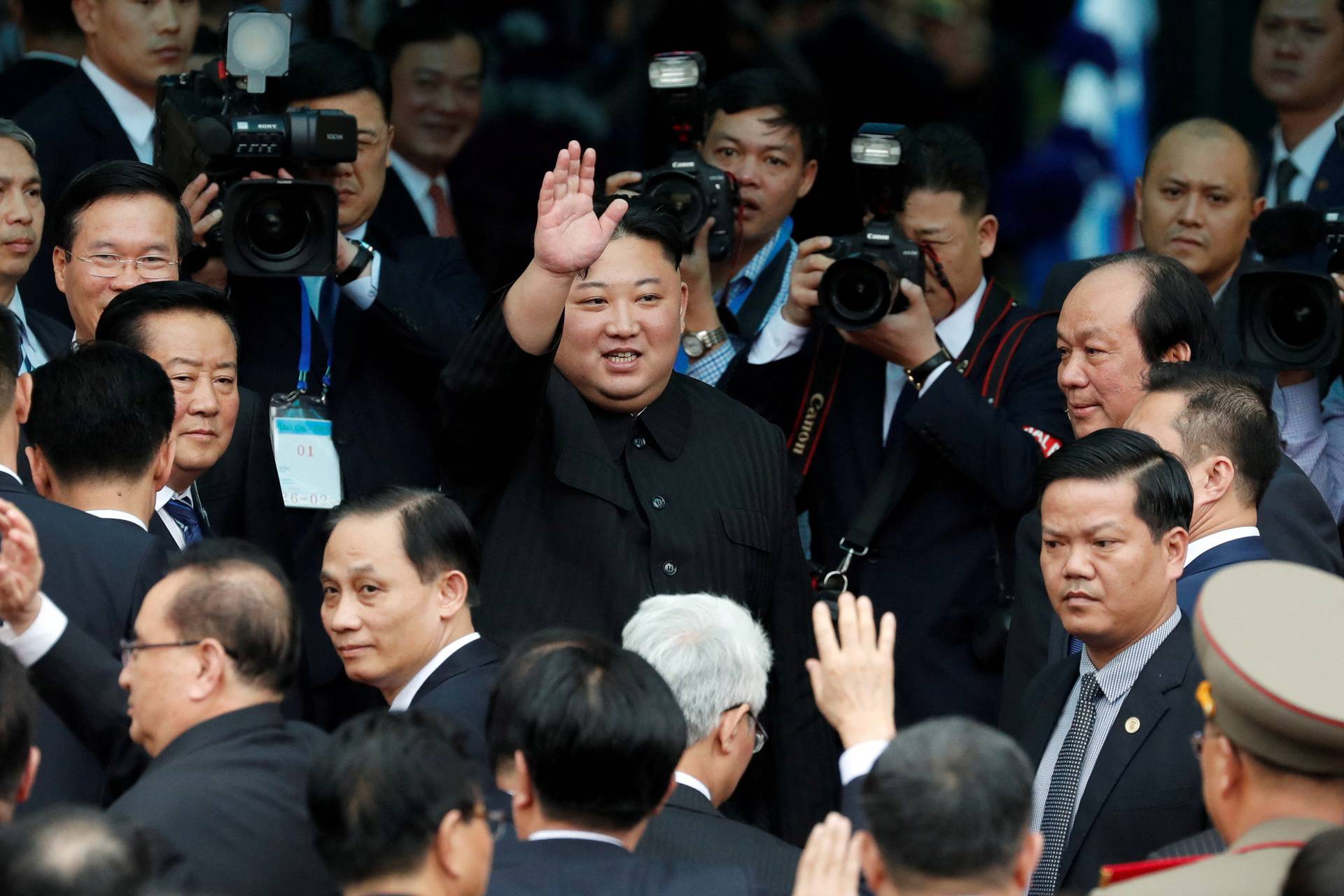 FILE PHOTO: North Korean leader Kim Jong Un waves before boarding his train to depart for North Korea at Dong Dang railway station in Vietnam