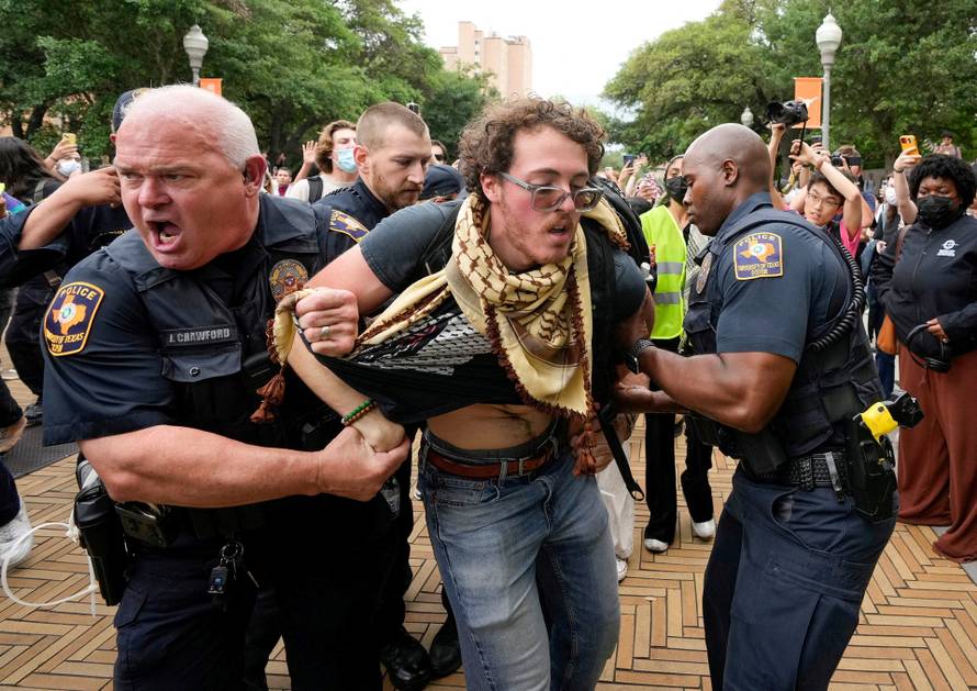 Texas state troopers arrest a man at a pro-Palestinian protest at the University of Texas