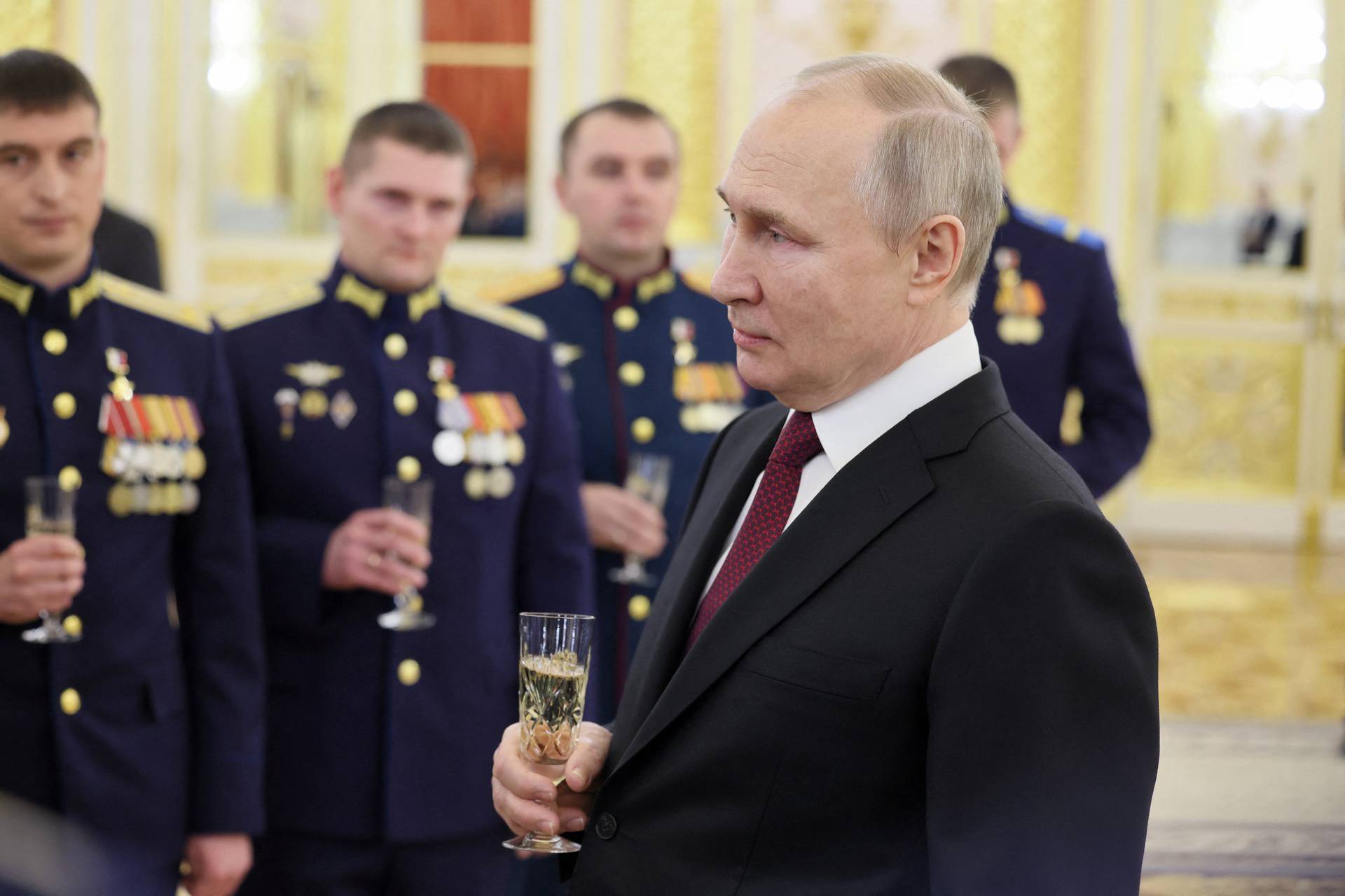 Russian President Vladimir Putin attends a ceremony to award Gold Star medals to Heroes of Russia, in Moscow
